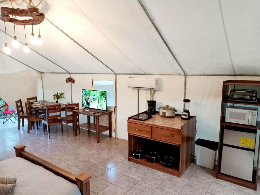 Volcano Tenorrio Glamping Tent suite cooking area with appliances, including a cooking burner, countertop